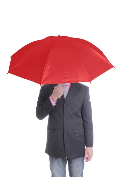Homme d'affaires tenant un parapluie rouge — Photo