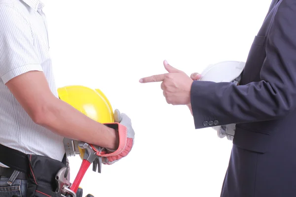 Инженер показывает руку, чтобы дать команду работнику — стоковое фото
