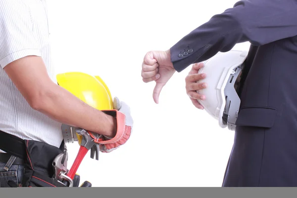 Engenheiro mostrar mão para dar ao contrário do trabalhador — Fotografia de Stock