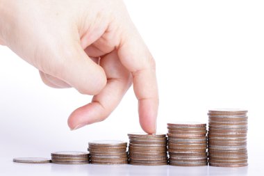 parmak yığın paranın üstüne git