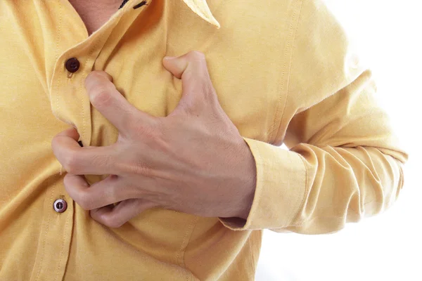Hartaanval, gebruik hand grijpen een borst — Stockfoto