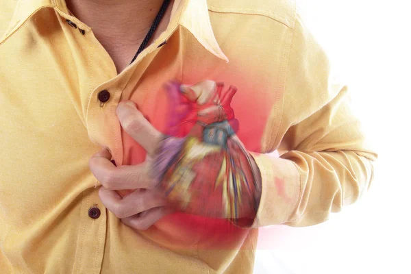 Atac de cord, Utilizați mâna apucând un piept — Fotografie, imagine de stoc