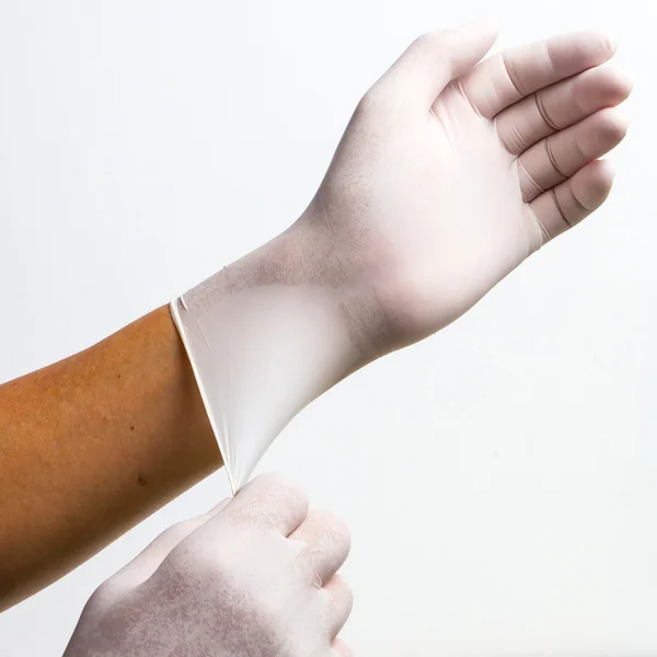 Dotor mit Handschuhen — Stockfoto