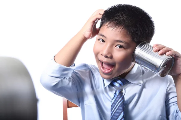 Lovely boy listen tin can telephone — Stock Photo, Image