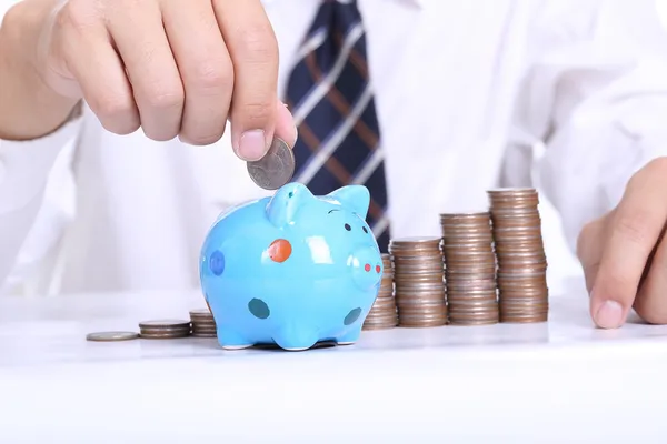 Piggy bank officer put money inside — Stock Photo, Image