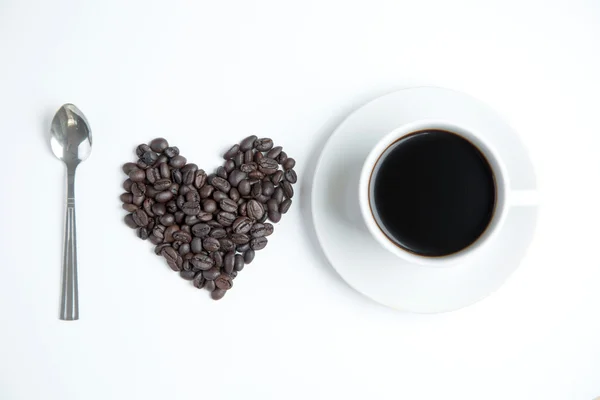 Hart van liefde met kop koffie — Stockfoto