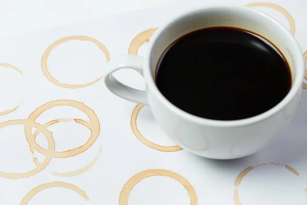 Cup  and foot printed of coffee o — Stock Photo, Image