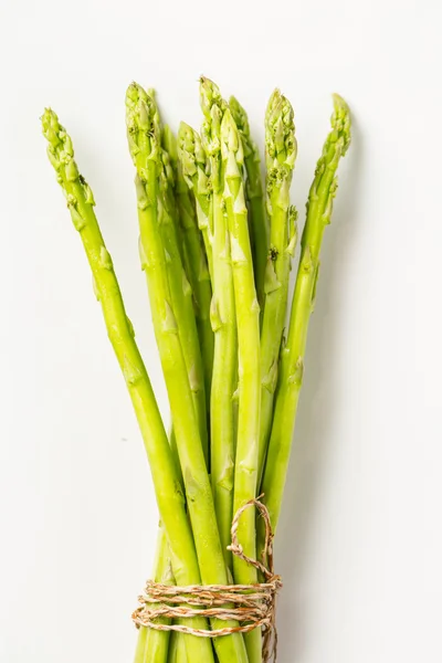 Bunch of fresh asparagus tie — Stock Photo, Image