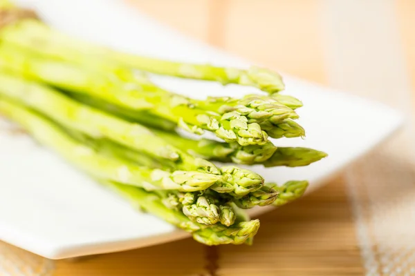 Bunch of fresh asparagus tie — Stock Photo, Image