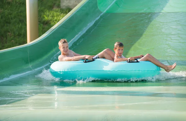 Boys in aquapark — Stock Photo, Image