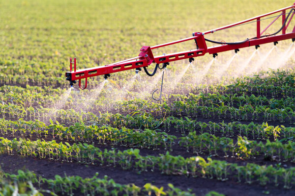 Nozzle of the tractor sprinklers sprayed.Soybean spraying.