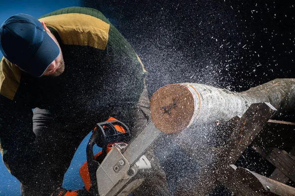 Worker Cuts Firewood Chainsaw — Photo