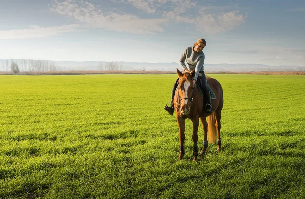 Beautiful Young Woman Riding Brown Horse Field — Stock fotografie