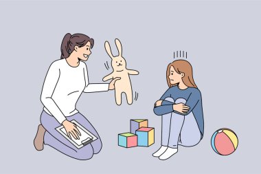 Kadın psikolog depresyondaki genç kıza yardım ediyor 