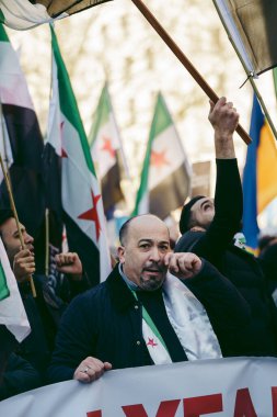 Hükümetin, Londra 'nın 124; İngiltere - 2022.03.19: Suriye ve Ukrayna halkı Rusya' ya İngiliz Hükümeti, AB ve ABD 'den Ukrayna' daki savaşı durdurmak için daha sert yaptırımlar talep etmek üzere toplandı.