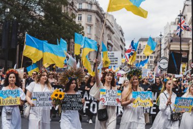 London / UK - 02/07/2022: Ukrainian people with flags and banners celebrating London LGBTQ Pride Parade