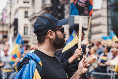 London / UK - 02/07/2022: Ukrainian people with flags and banners celebrating London LGBTQ Pride Parade