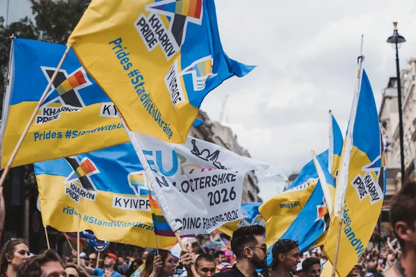 London / UK - 02/07/2022: Ukrainian people with flags and banners celebrating London LGBTQ Pride Parade