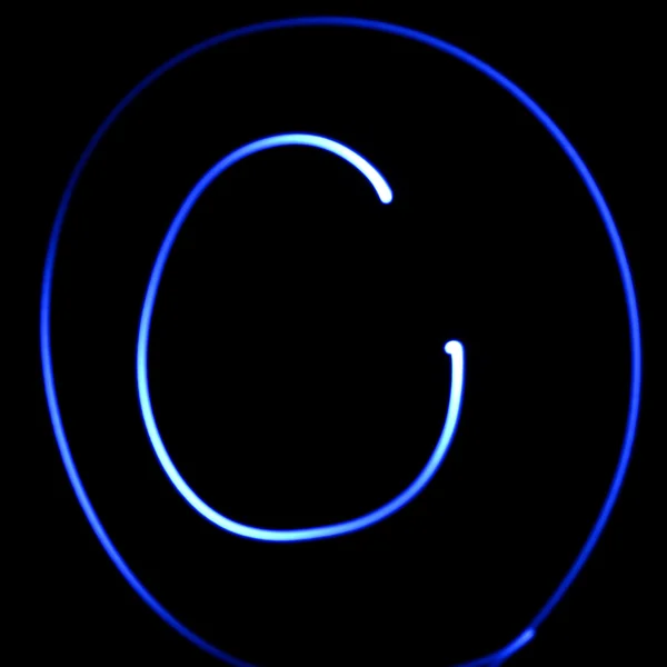 Simbolo ondulato. Alfabeto a luce laser. Simbolo "C ". — Foto Stock
