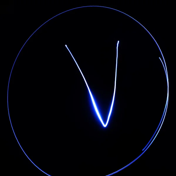 Wavy symbol. Laser light alphabet. Symbol "V". — Stock Photo, Image
