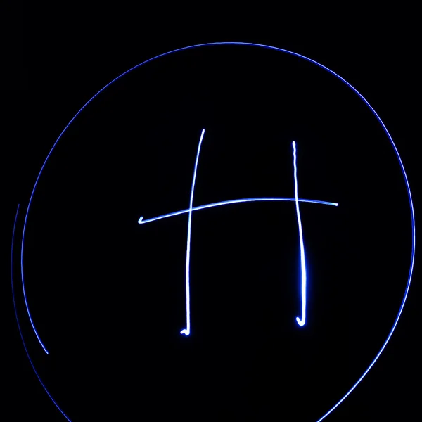 Wavy symbol. Laser light alphabet. Symbol "H". — Stock Photo, Image