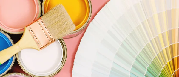 A painter is choosing a paint shade for the interior of the house\'s walls. with interior