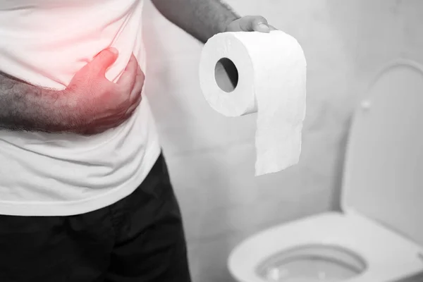 Man Suffers Diarrhea Hand Hold Tissue Paper Roll Front Toilet — Stock Photo, Image
