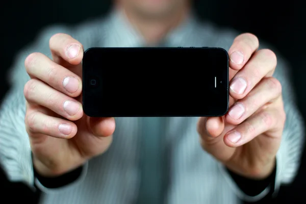 Geschäftsmann mit Telefon — Stockbild Geschäftsmann mit Telefon — Stockfoto