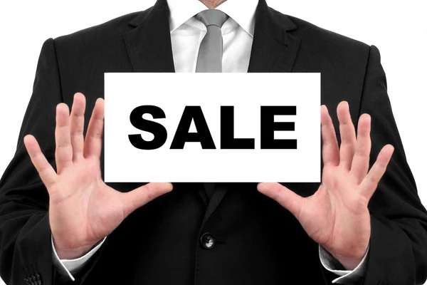 Prodej. podnikatel v černé a bílé košile s černou kravatou, ukazuje vizitka — Stock fotografie