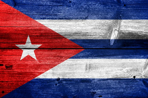 Vlajka Kuby nebo kubánské banner na dřevěné pozadí — Stock fotografie