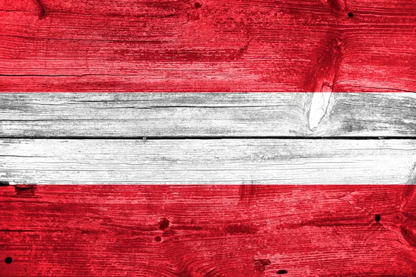 Austria Flag painted on old wood plank background — Stock Photo, Image