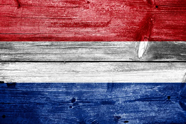 Netherlands Flag painted on old wood plank background — Stock Photo, Image