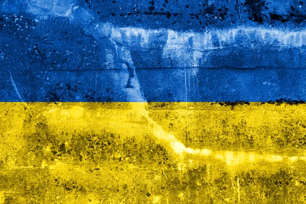 Ukrainische Flagge an der Grunge-Wand — Stockfoto