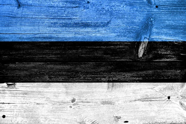 Estonya bayrağı eski ahşap tahta zemin üzerine boyalı — Stok fotoğraf