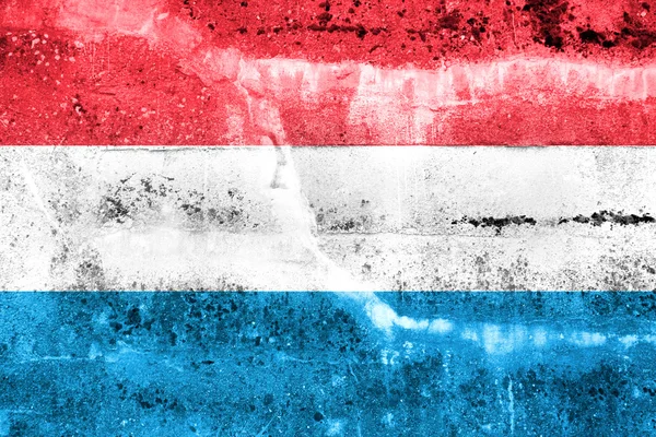 Bandera de Luxemburgo pintada en la pared grunge — Foto de Stock