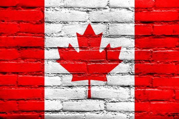 Bandera de Canadá pintada en la pared de ladrillo viejo —  Fotos de Stock