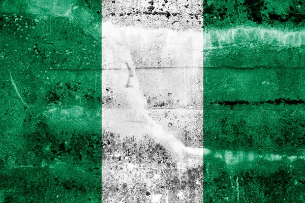 Vlajka Nigérie maloval na zdi grunge — Stock fotografie