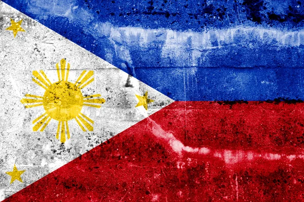 Filippiinit lippu maalattu grunge seinään — kuvapankkivalokuva