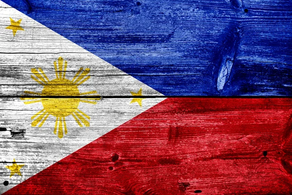 Philippines Flag painted on old wood plank texture — Stock Photo, Image