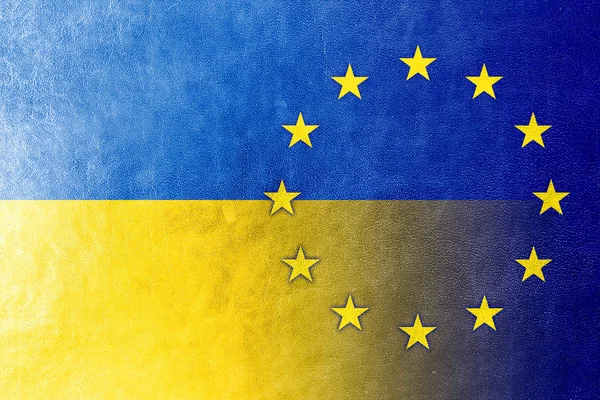EU and Ukraine Flag painted on leather texture — Stock Photo, Image