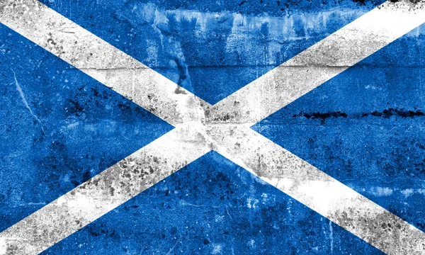 苏格兰国旗画在 grunge 的墙上 — 图库照片