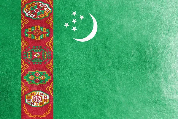 Turquemenistão Bandeira pintada sobre textura de couro — Fotografia de Stock