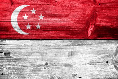 eski ahşap tahta dokusu üzerinde boyalı Singapur bayrağı