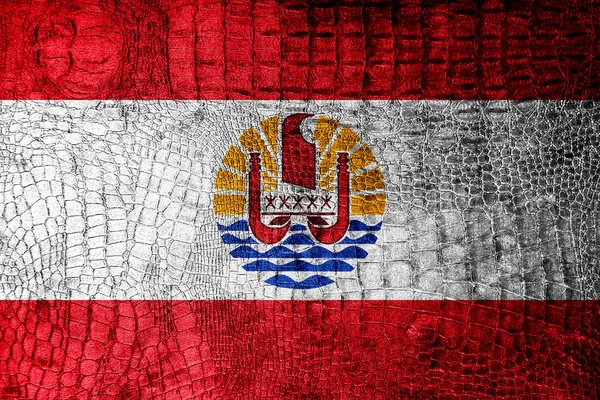 Frans-Polynesië vlag geschilderd op luxe krokodil textuur — Stockfoto