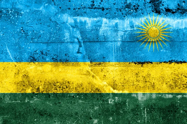 卢旺达国旗画在 grunge 的墙上 — 图库照片