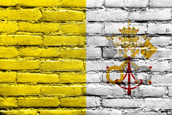 Drapeau du Vatican peint sur un mur de briques — Photo