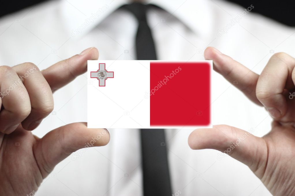Businessman holding a business card with Malta Flag