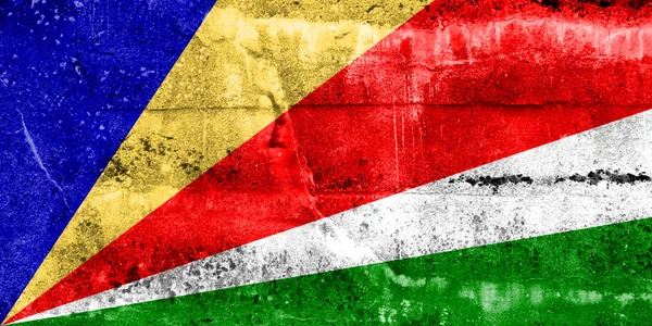 Seychellen-Flagge an Grunge-Wand gemalt — Stockfoto