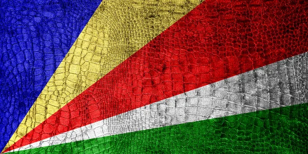 Сейшельский флаг, окрашенный в роскошную текстуру крокодила — стоковое фото