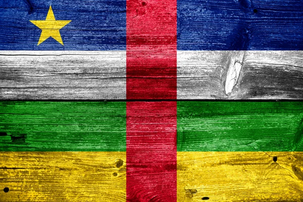Central African Republic Flag painted on old wood plank texture — Stock Photo, Image